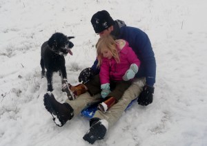 Sledging family fun. No hills round us so more pushing than sledging...
