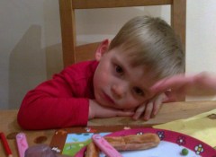 My son refusing to eat his dinner. So cute...