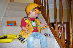 My Bob Builder boy fixing the stairs (because Daddy hasn't!)