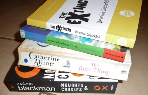 My eclectic half-read pile of books