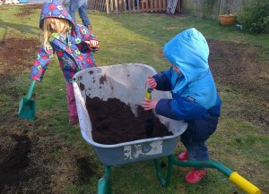 Scattering grass seed with Daddy