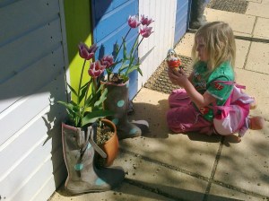 I'm Just looking at these gnomes and flowers Mummy