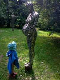 Mummy, why does the lady have a big tummy?