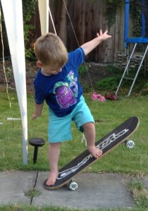 Practising skateboard at friends' BBQ