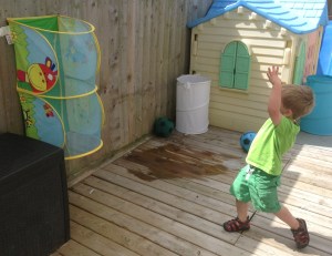 Shooting hoops in a makeshift basket