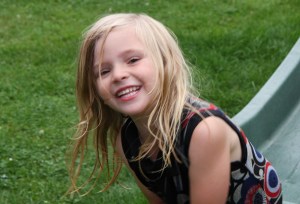 Getting soaked in her best dress