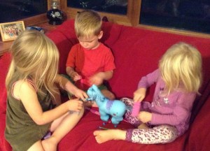 Captured for posterity: cousins cooperating!