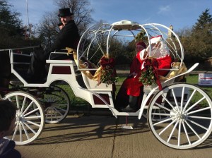 Father Christmas arriving by carriage