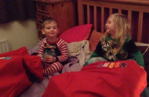 Happy faces at filled Santa Sacks